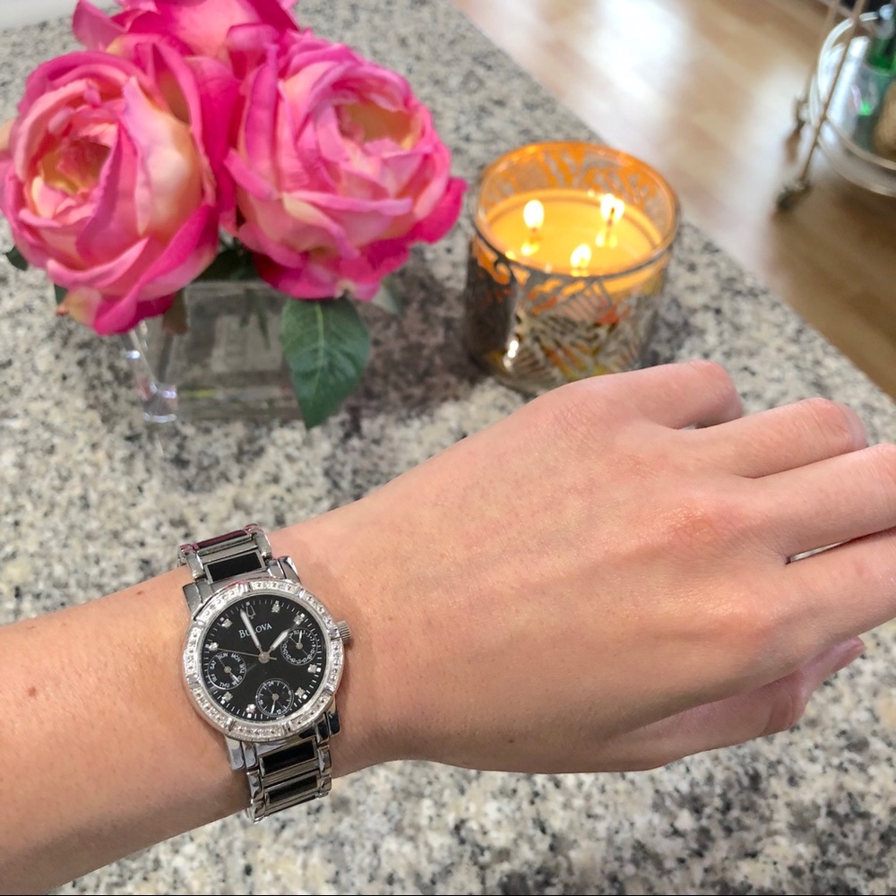 Bulova watch - black and silver with diamonds.